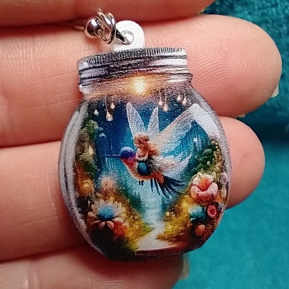 Cute colorful fairy on hummingbird in jar wire earrings fantasy garden